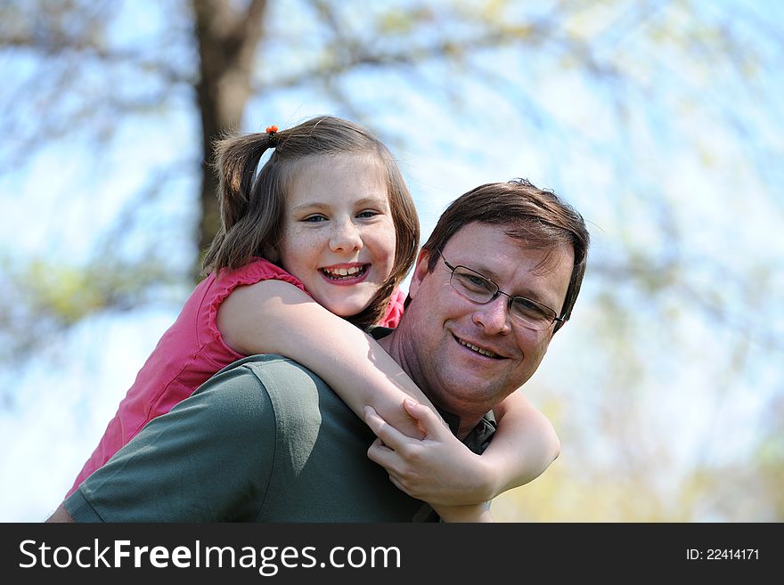 Father and Daughter Having Fun outdoors on a sunny day. Father and Daughter Having Fun outdoors on a sunny day