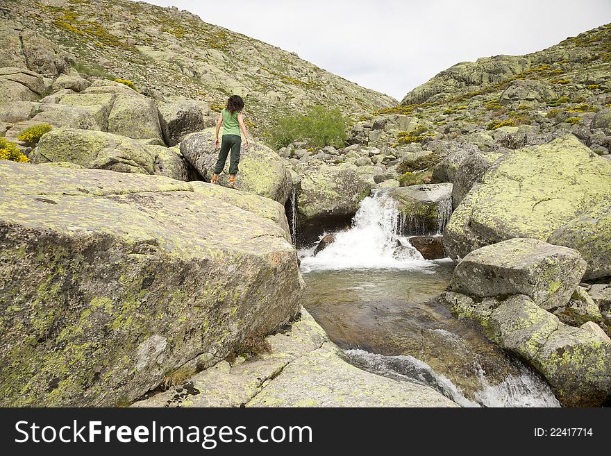 Woman at green cascade