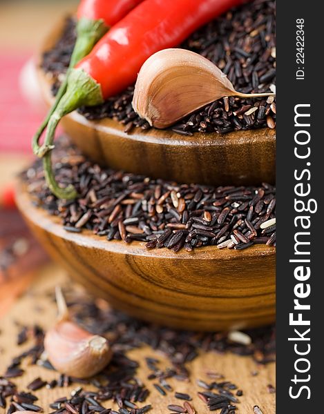 Brown rice in wooden bowls. Brown rice in wooden bowls