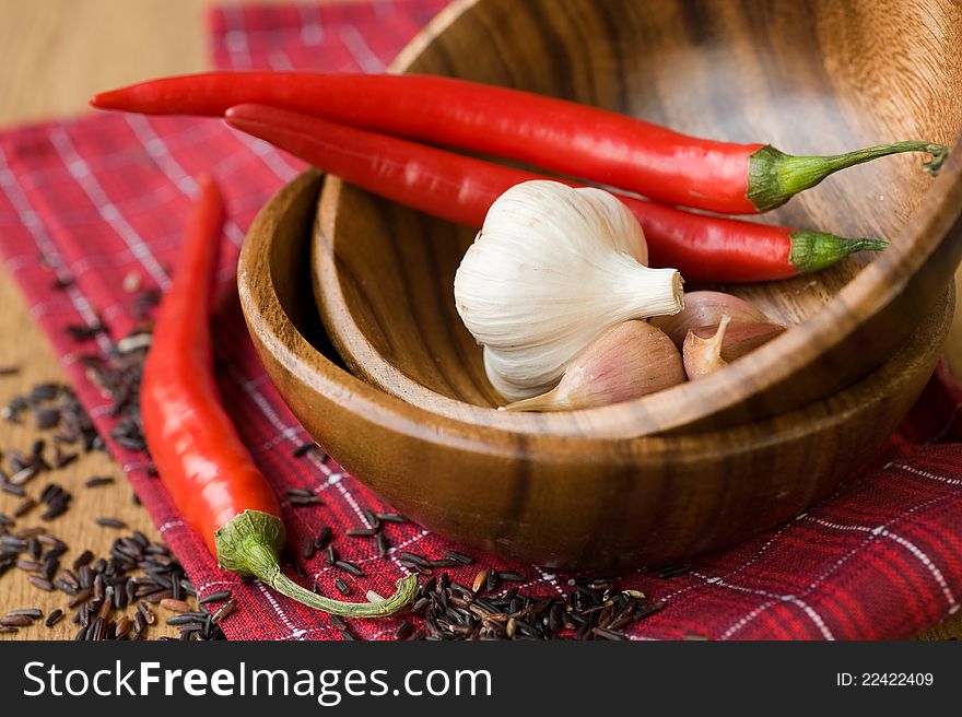 Red chili pepper and garlic in bowls