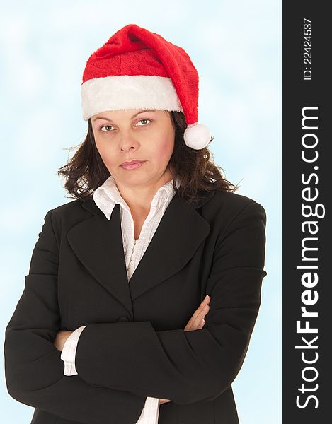 Business woman with a hat of Santa Claus