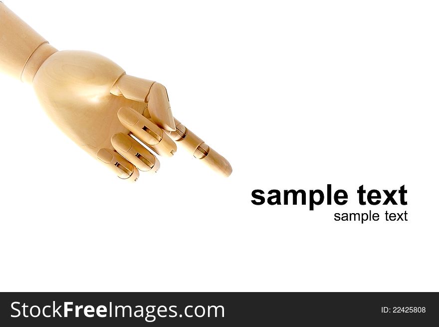 Wooden hand model pointing to text on white background. Wooden hand model pointing to text on white background