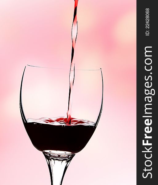 New Year's red  wine over bokeh background. New Year's red  wine over bokeh background