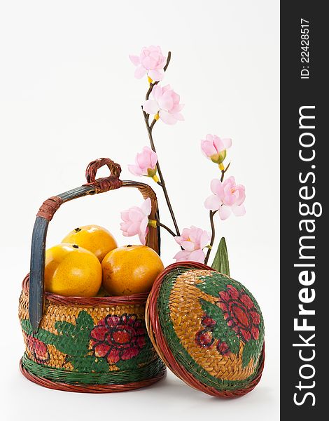 Oranges in Vintage basket with flower and Blessing word. Oranges in Vintage basket with flower and Blessing word