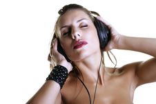 Woman Listening To Music Using Headphones Stock Photo Woman Listening To Music Using Headphones Stock Photo