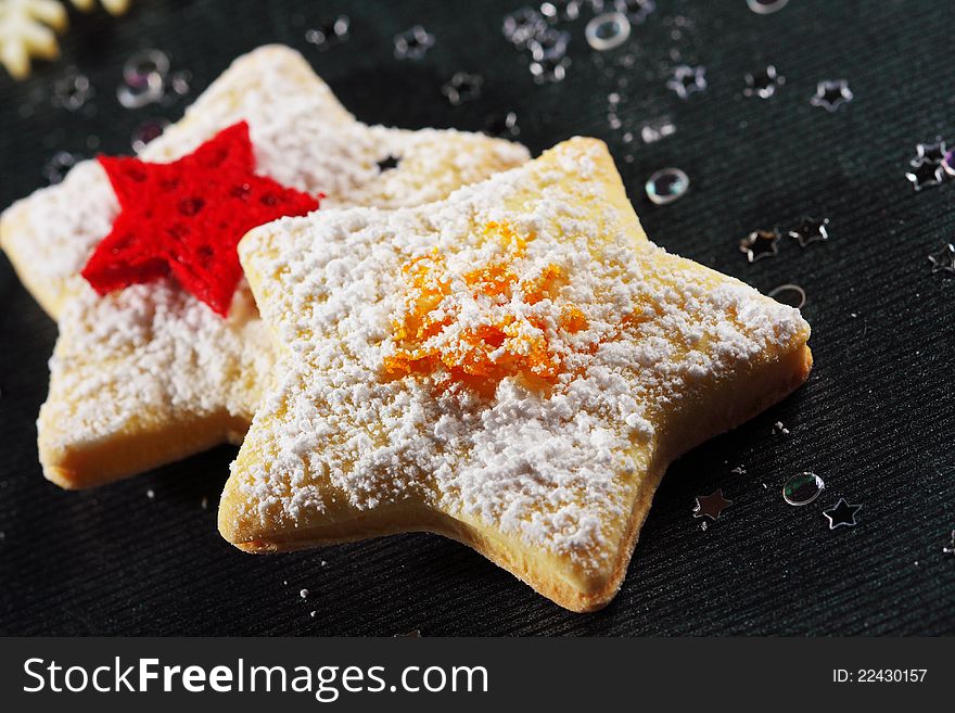 Christmas butter cookies on black background