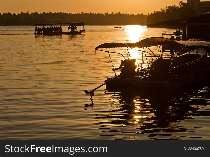 Amphawa floating market in evening , thailand