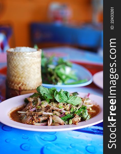 Spicy salad of grilled pork with Thai style food set , Asian style food in Thailand