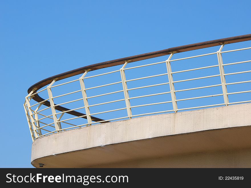 Balcony building exterior against blue sky. Balcony building exterior against blue sky