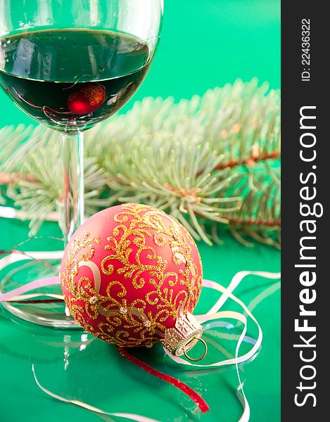 New Year's still life - glasses of wine and Christmas balls