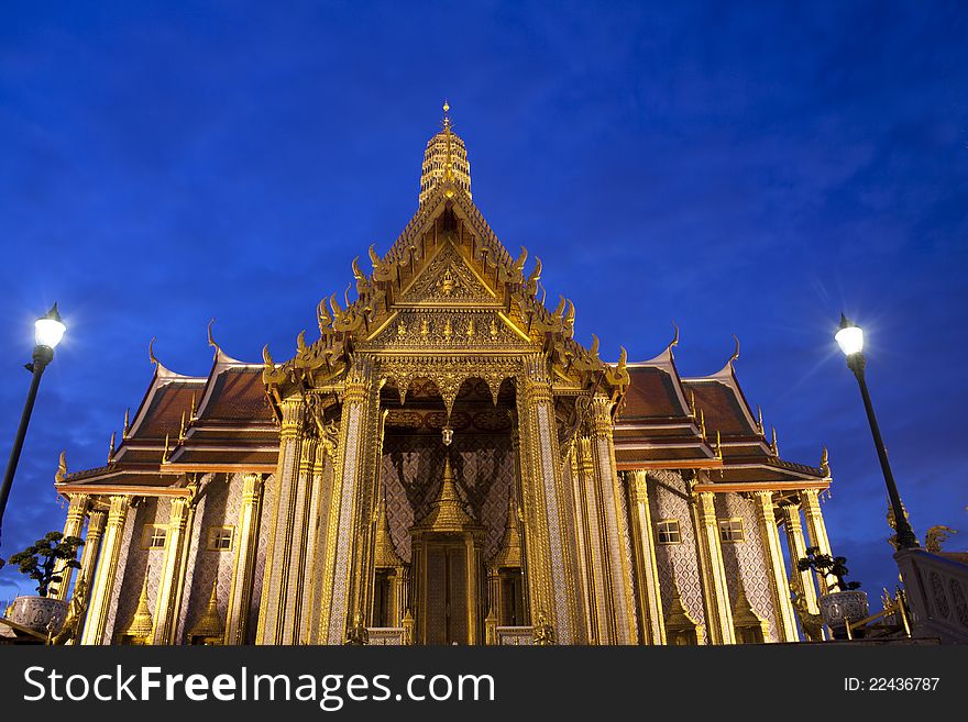 Buddhist temple Grand Palace at night in Bangkok, Thailand