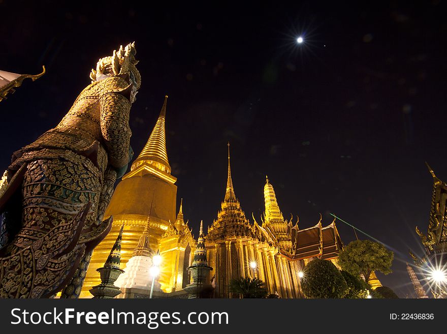 Buddhist temple Grand Palace at night in Bangkok, Thailand