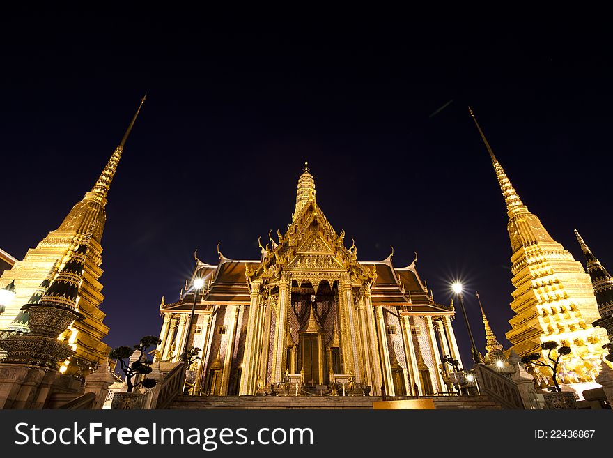 Buddhist temple Grand Palace at night in Bangkok, Thailand