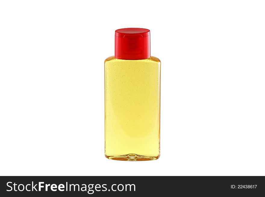 A bottle of Shower Oil for dry skin, isolated on white, with bubbles inside. A bottle of Shower Oil for dry skin, isolated on white, with bubbles inside