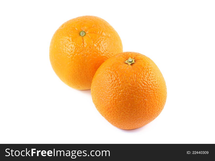 Closeup photo of two fresh Mandarin oranges on white background