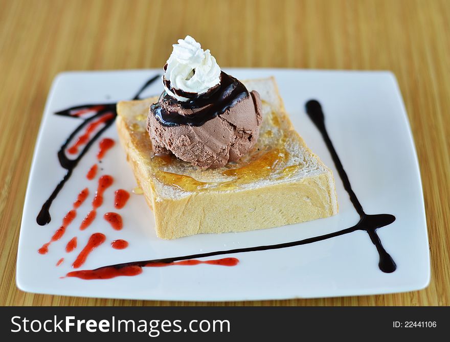 Honey toast  and whipping cream with chocolate ice cream. Honey toast  and whipping cream with chocolate ice cream