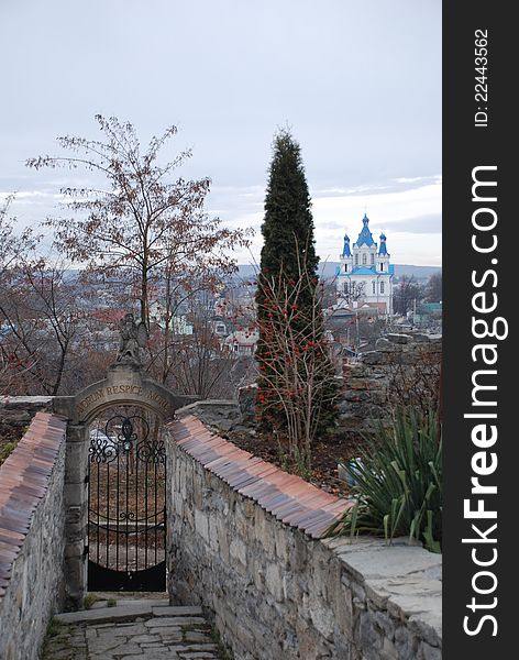 Beautiful landscape with a cemetery gates