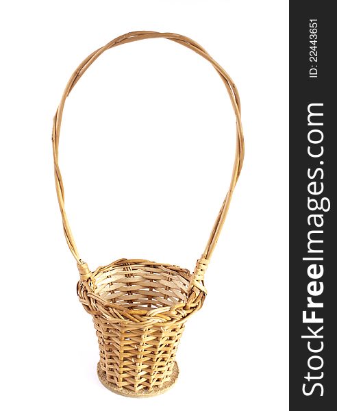 Empty brown wicker basket isolated on white