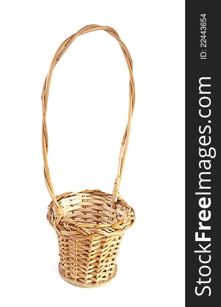 Empty brown wicker basket isolated on white