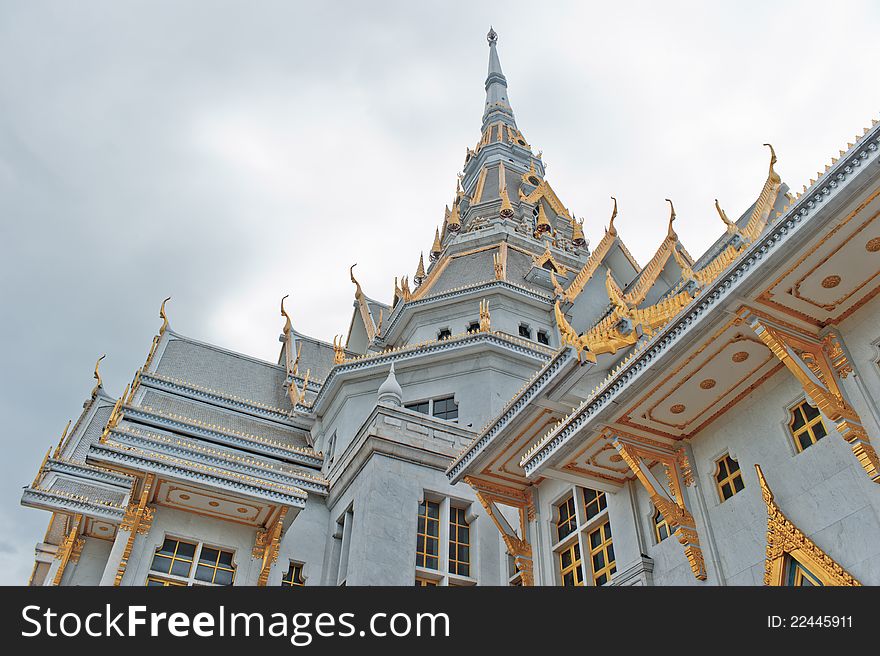 Thai temple and cloudy sky