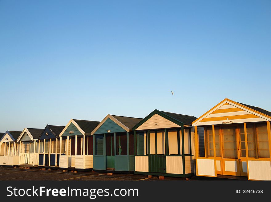 Beach Huts In Golden Sunlight