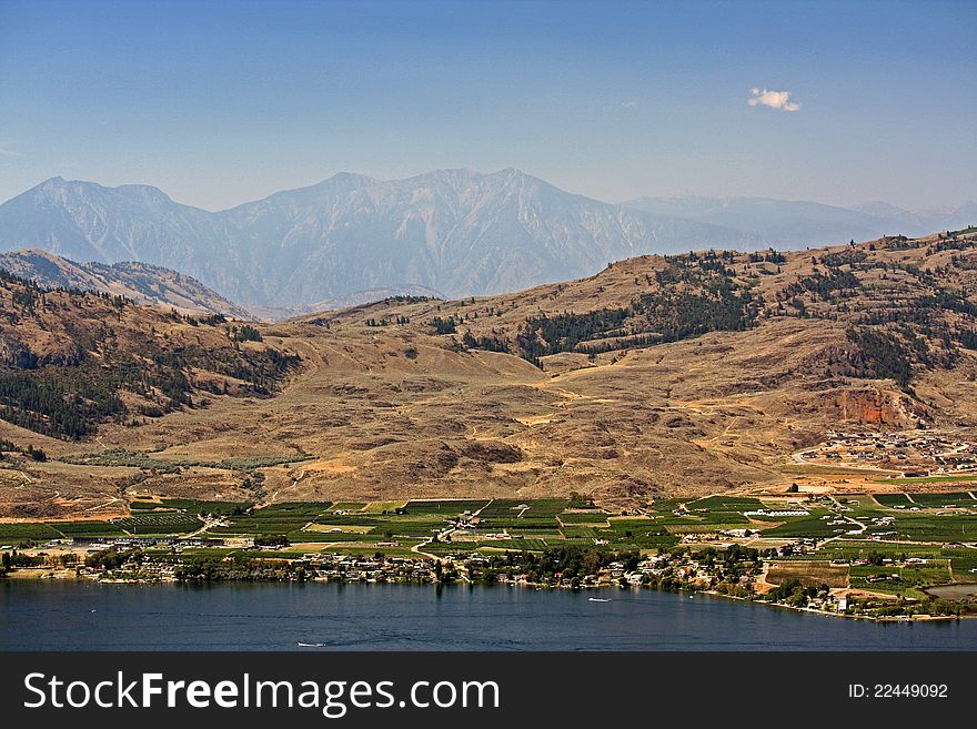 When I am travelling through Osoyoos I am always struck by the contrast of desert and the lush farmland on the banks of Osoyoos Lake. The winds have blown a smokey haze over the town from a nearby forest fire.