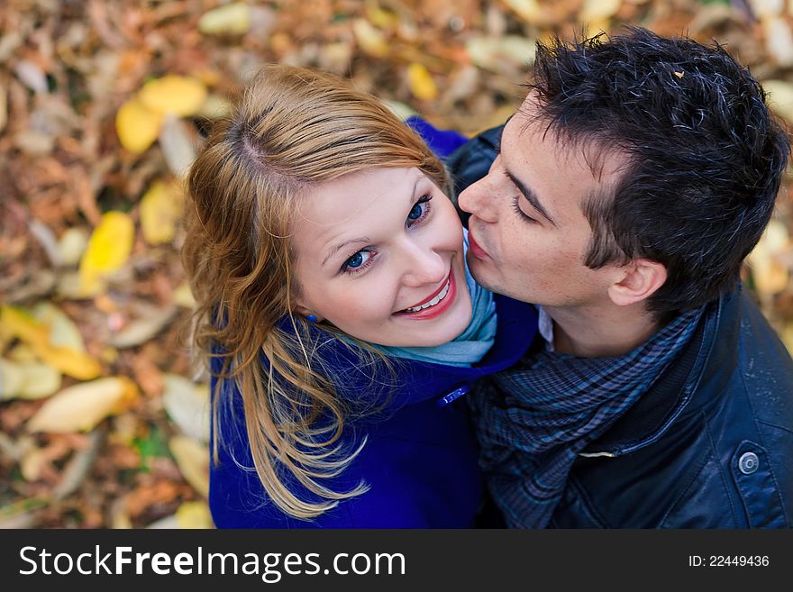 Happy Couple Standing Together in the Park During Autumn. Happy Couple Standing Together in the Park During Autumn