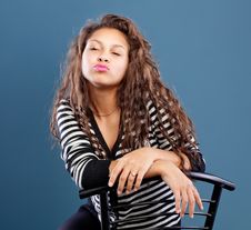 Young Happy Girl Sitting With Closed Eyes Royalty Free Stock Images