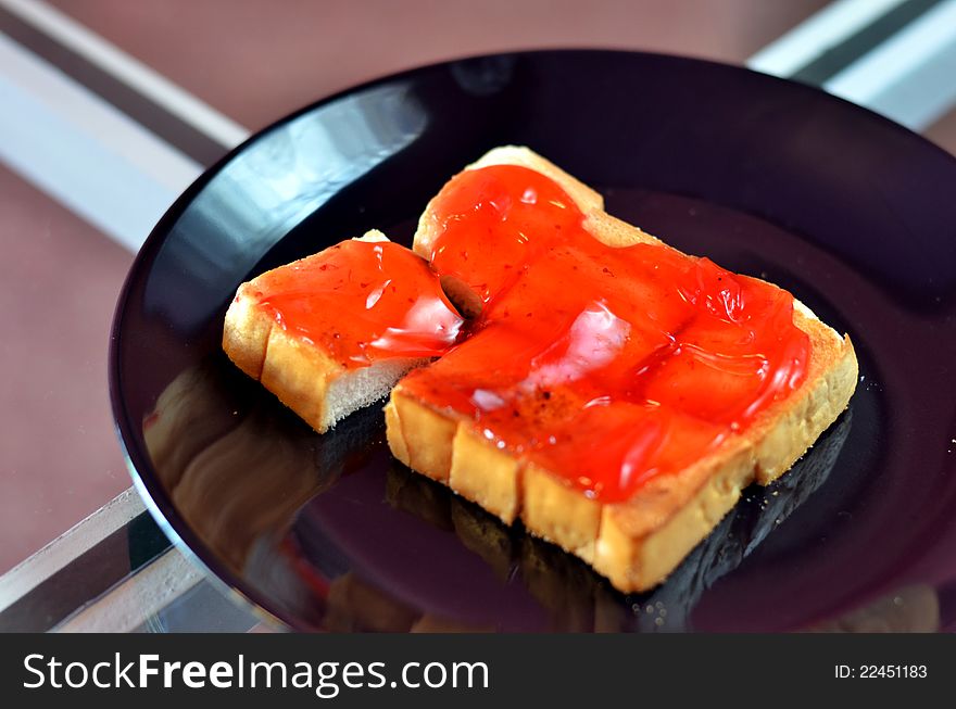 Strawberry jam with toast , delicious dessert. Strawberry jam with toast , delicious dessert