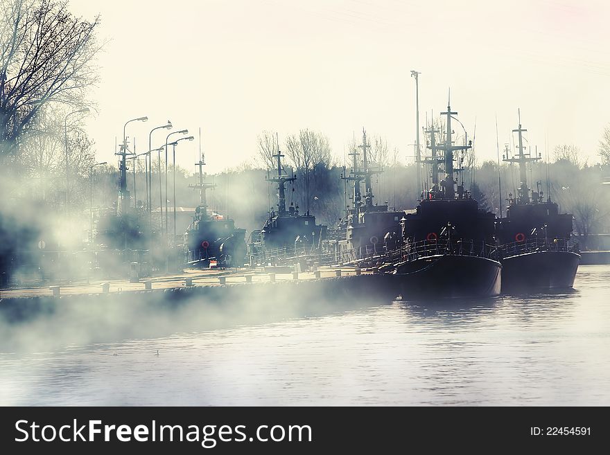 Group of military ships in Poland river port. Group of military ships in Poland river port