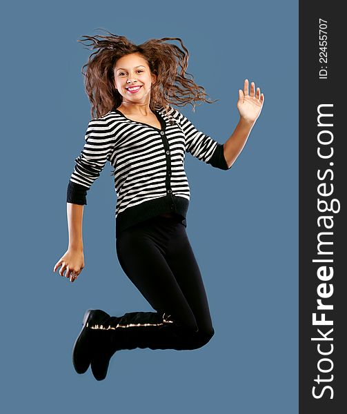 Young Beautiful Happy Woman Jumping