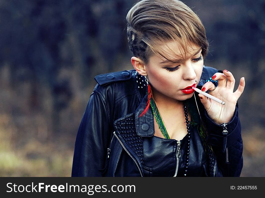 Hipster with leopard haircut smoking cigarette