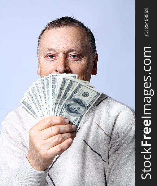 Portrait Of  Mature Man Holding Dollars