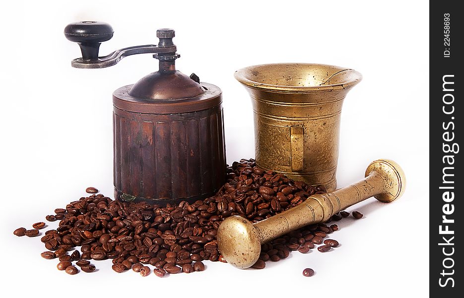 Antique coffee mill on white background