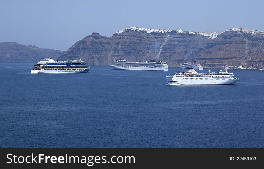 A  view from a cruiseship on Santorini Greecewith cruiseships. A  view from a cruiseship on Santorini Greecewith cruiseships