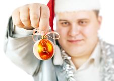 Young Man Holding A Christmas Toy. Royalty Free Stock Images Young Man Holding A Christmas Toy. Royalty Free Stock Images