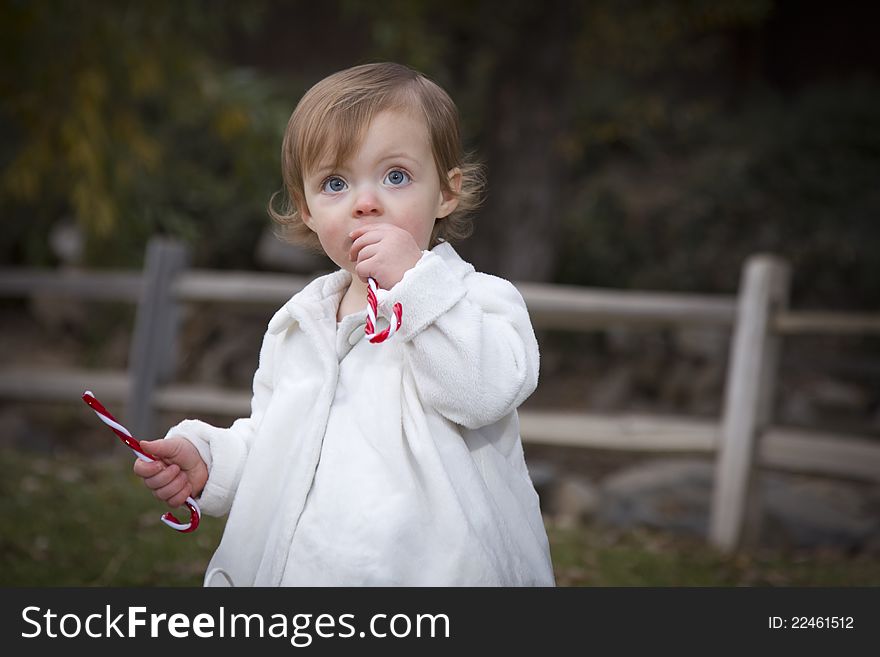 Adorable Baby Girl Playing in Park