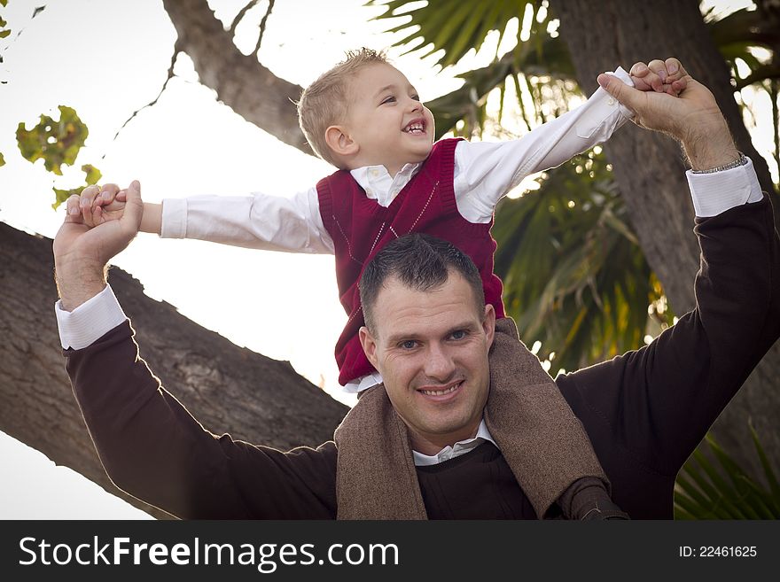 Handsome Father And Son In The Park