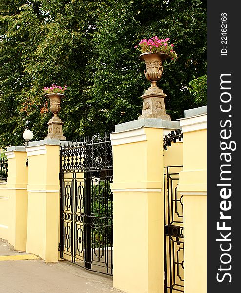 Openwork gates with columns in the classical style. Openwork gates with columns in the classical style