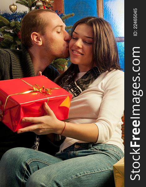 Girl receiving christmas gift