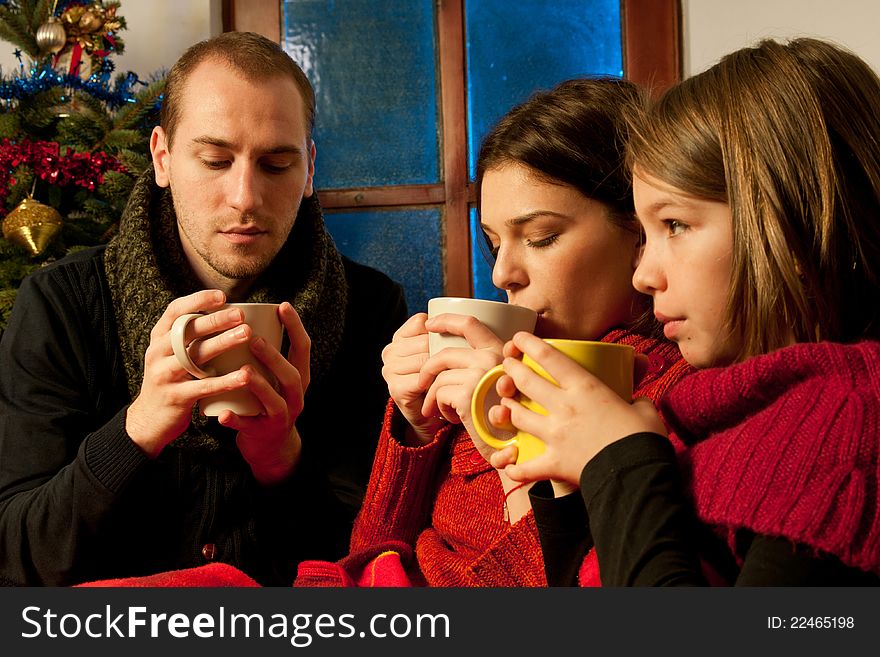 Young people relaxing with tea