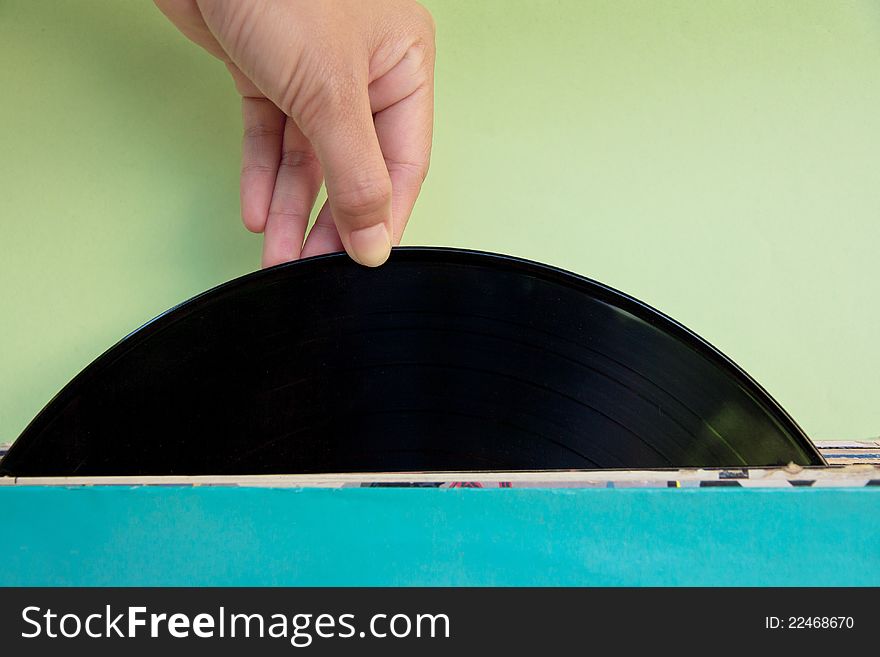 Hand Holding A Record