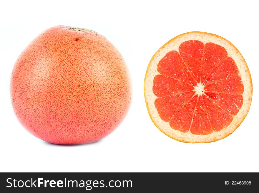 Hole and half of Grapefruit on white background