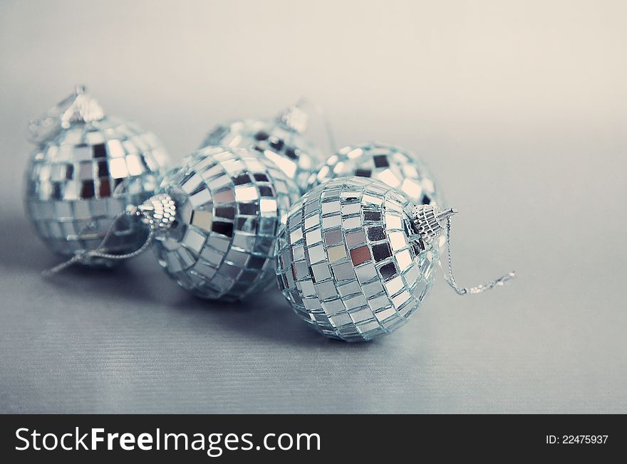 Holiday Greeting Card .Christmas composition of a silver christmas baubles . Holiday Greeting Card .Christmas composition of a silver christmas baubles .