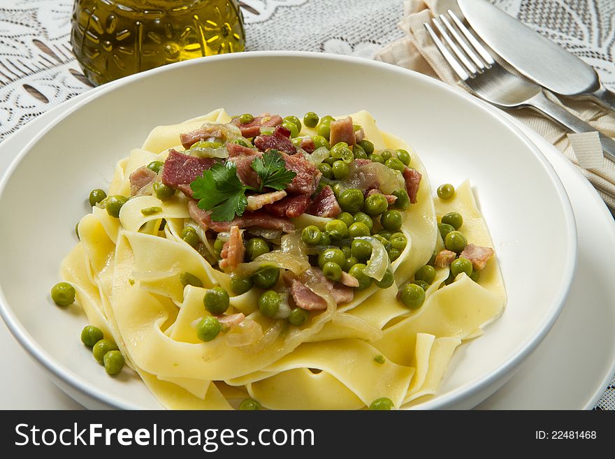 Tagliatelle with fresh peas and diced ham. Tagliatelle with fresh peas and diced ham