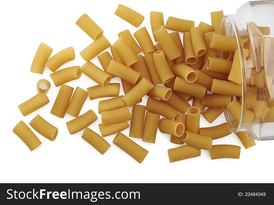 Dried pasta in a glass jar on white background. Dried pasta in a glass jar on white background