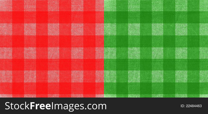 Plaid fabric texture in red and green.