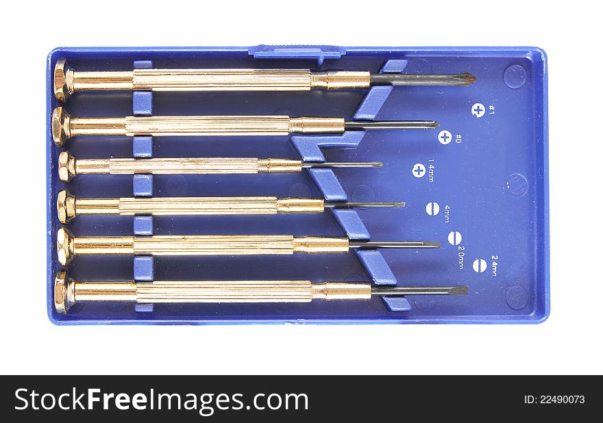 Set of six metal screwdrivers in the box on white background