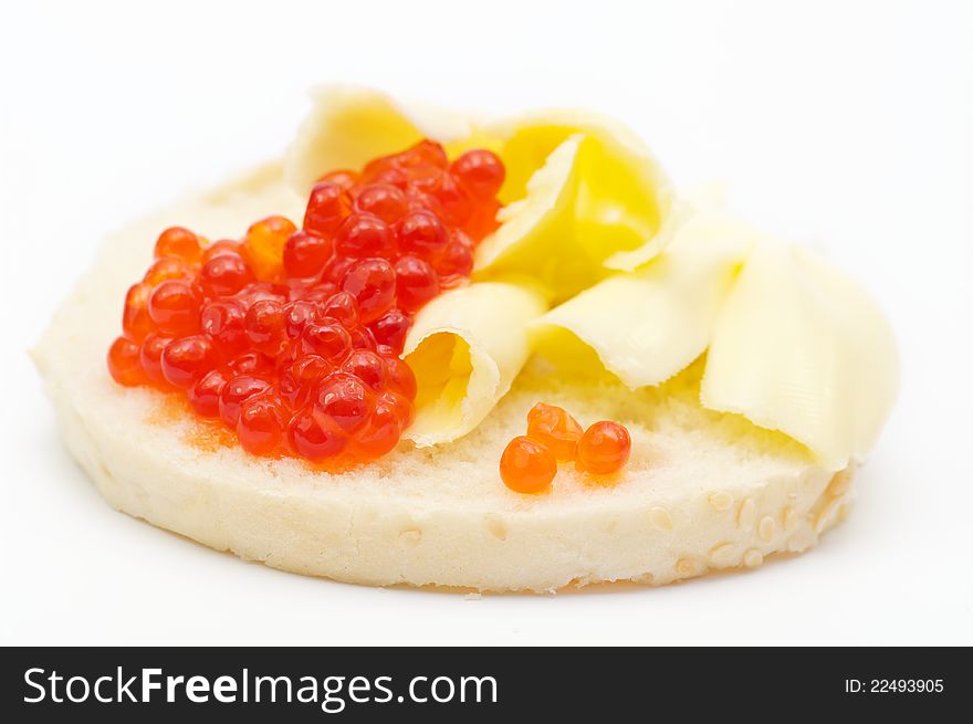 Sandwich with oil and red caviar