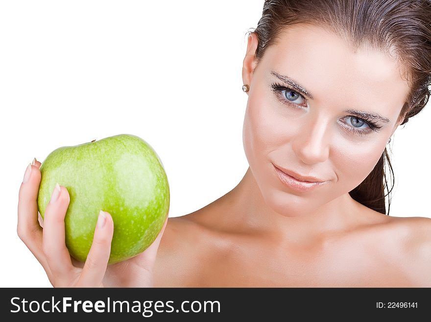 Beautiful girl holds in a hand green apple, isolated on white background. Beautiful girl holds in a hand green apple, isolated on white background